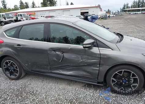 2012 Ford Focus Titanium z USA, uszkodzony, nr VIN 1FAHP3N28CL210557